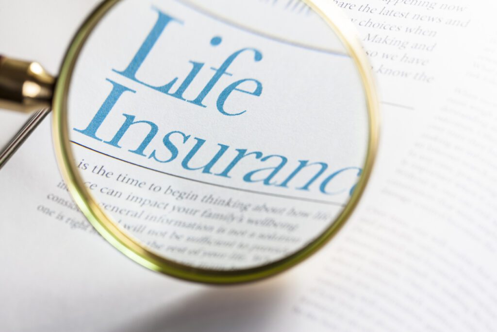Life Insurance on magazine with magnifying glass. ++All text written by photographer++